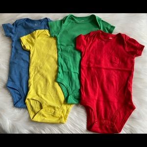 Set of 4 colorful onesies from Carters
